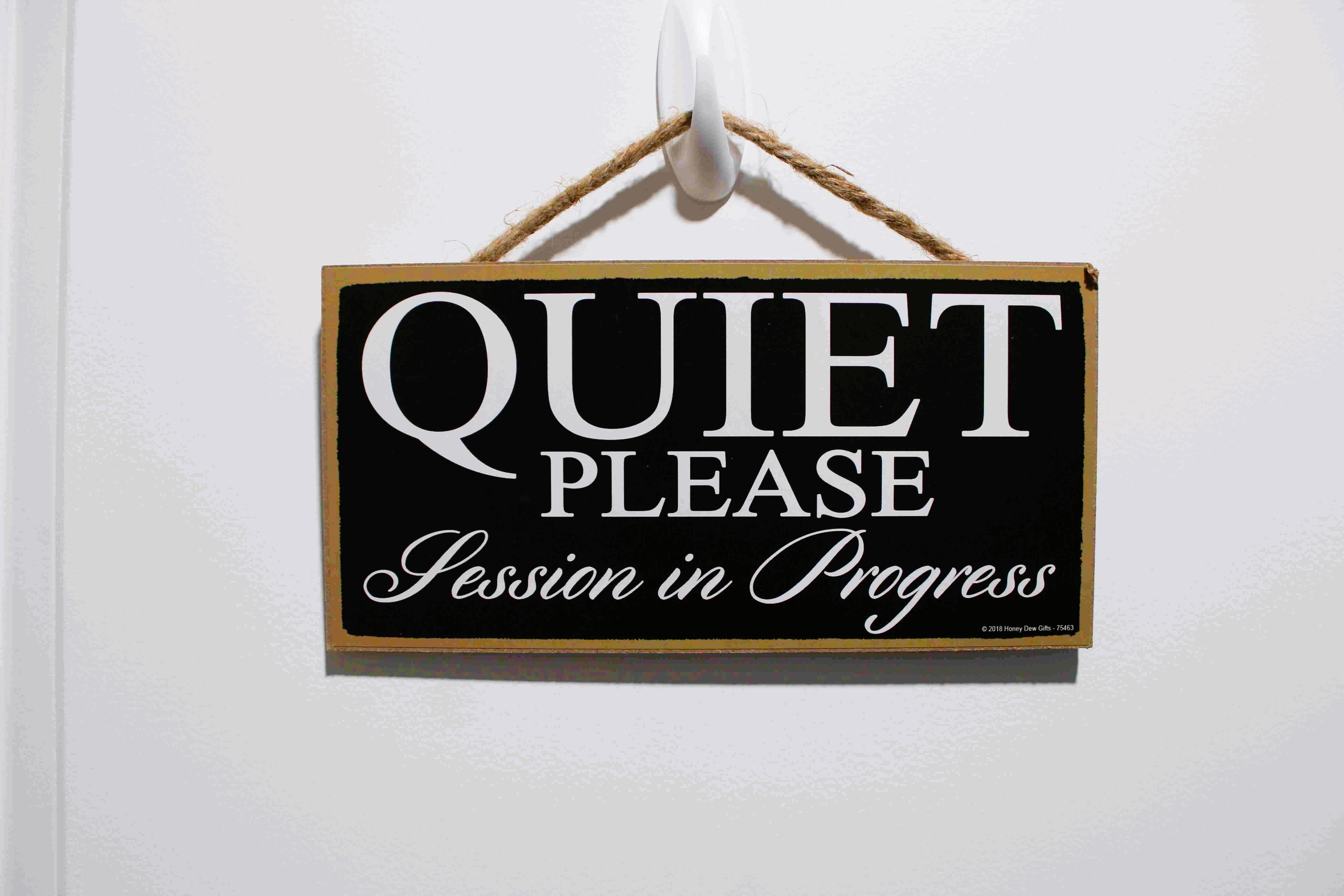 a sign indicating customers to be quiet at lakeshore massage therapy in North Muskegon